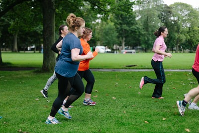 Women jogging at outdoor boot camp in the Meadows, Edinburgh. Fit &amp; Happy Personal Training